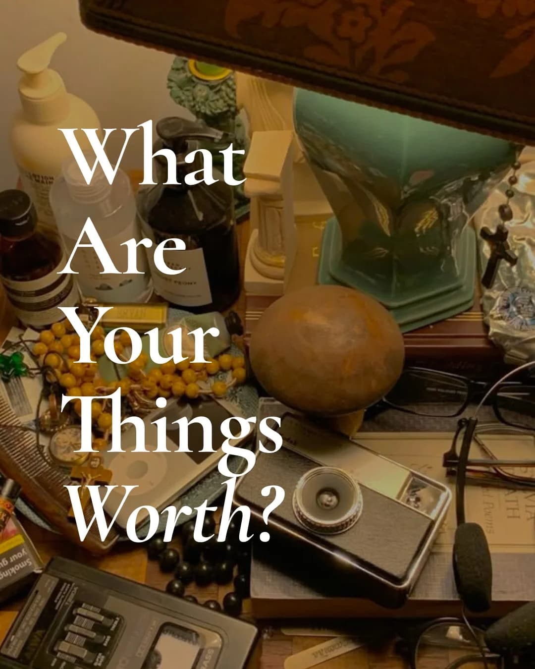 Instagram post: What are your things worth? A cluttered desk of old belongings including a vintage camera